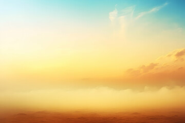 Fototapeta premium Serene sunset over a misty landscape, warm golden hues, peaceful atmosphere, perfect for backgrounds or design projects.