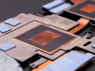 Close up of fan copper cooling system. Fixing notebook. Repairing computer.