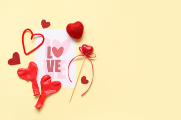 Card with text LOVE and heart shaped decor on yellow background. Valentines Day celebration