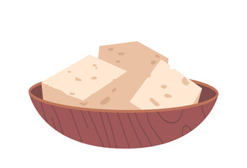 Tofu pieces in wooden bowl