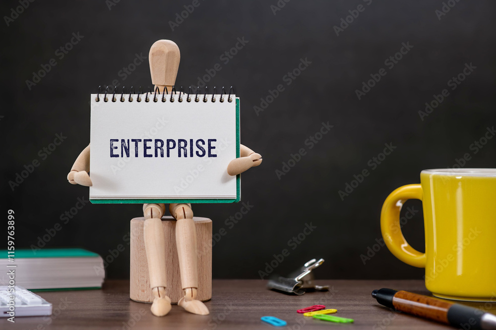 Poster there is notebook with the word enterprise. it is as an eye-catching image.