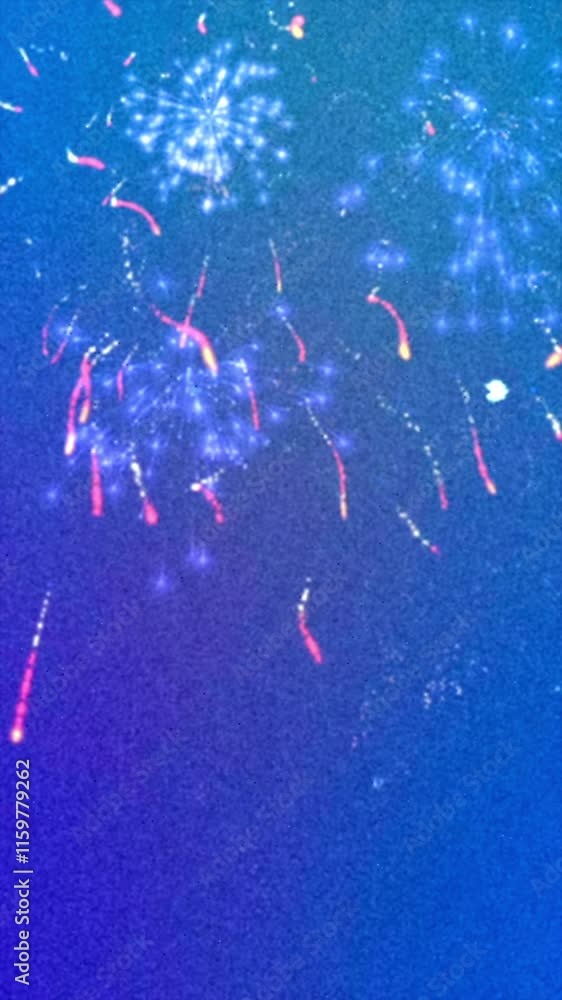 Poster vertical video with vibrant fireworks display with bright trails and sparks against a gradient blue 