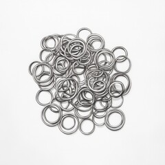 Collection of silver metal o-rings on white background