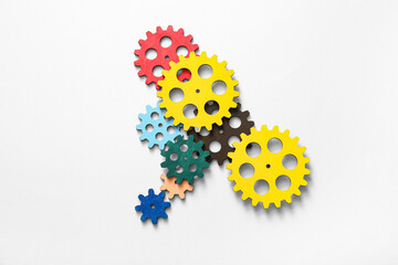 Wooden gears on white background