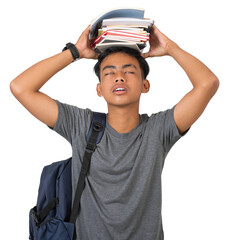 Tired young student carrying a lot of books for homework isolated on white background
