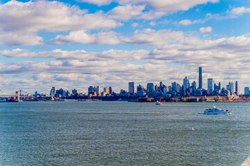 Fototapeta premium boat on water of new york view of city