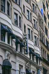 facade of a building with hotel light sign