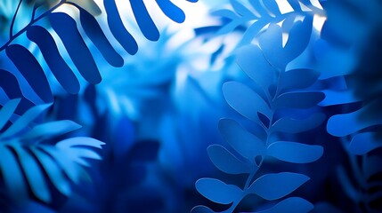 Paper cut out tropical leaves on a blue background. Tropical leaves, paper cut out foliage blue background plant in green color with copy space ,foliage plant in blue color with space background,