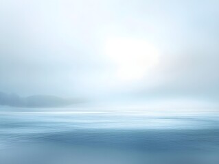 Fototapeta premium An abstract winter landscape with a blurred light blue background and snowy focus