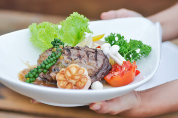 beef steak in gravy sauce or barbecued beef or grilled beef and vegetable
