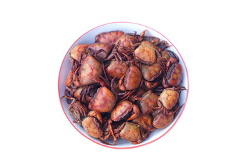 Boiled Thai crabs on dish, isolated on white background. Concept, Weird food. Edible animal. Local eating style in the northern of Thailand that villagers catch crabs from paddy field to cook. 