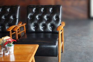Dark black leather sofa, Luxury leather sofa wood arm in vintage cafe