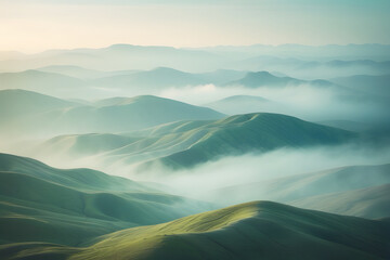 Create a tranquil mountain range with rolling hills, painted in layers of muted green and blue, enveloped by a thin mist.