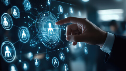 Businessman touching a human icon on a virtual screen, digital network connection between people in the business world for HR