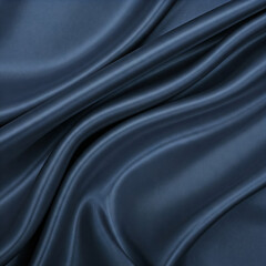 Obraz premium Navy blue silk satin. Dark elegant luxury abstract background with space for design. Shiny smooth fabric. Soft folds. Drapery. Color gradient. Lines. Wavy pattern. abstract texture background.