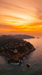 Beautiful sunrise at the entrance to Puerto Marques Bay in Acapulco. Warm colors paint the sky...