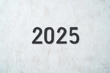 Bold 2025 Numbers on a Textured White Wall