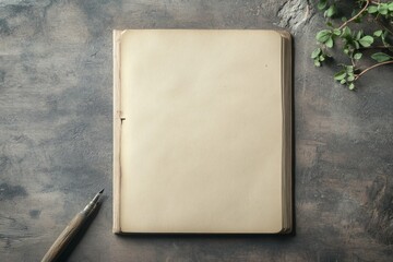 Vintage Open Book on Dark Surface with Pen and Leaves. Blank Page for Writing. Classic Still Life.