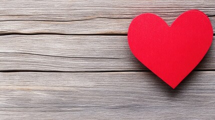 Fototapeta premium Red Heart Shape on Wooden Surface for Romantic Concepts and Themes