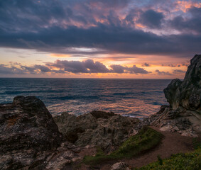 Coastal Sunrise Over Rocks
