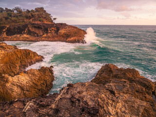 Coastal Morning with Waves Crashing on Rocks