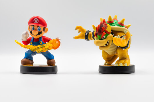 Nakhon Si Thammarat, Thailand - December 26, 2024 - Nintendo amiibo Super Smash Bros. series figure Mario vs Bowser on white background