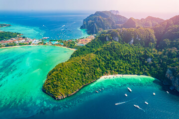 Amazing travel photo Thailand tropical paradise by drone. Aerial view sunset Phi Phi island, Krabi...
