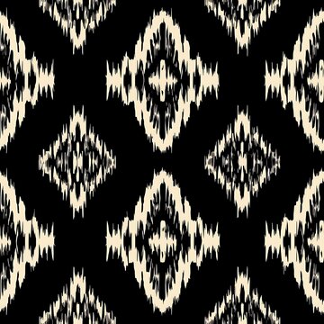 a black and white abstract pattern with a large diamond design