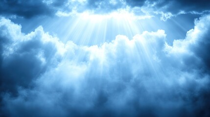 Fototapeta premium Bright sun rays breaking through dark clouds.