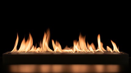Modern bio ethanol fireplace with flames on black background.