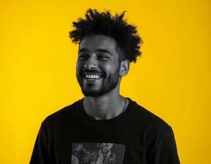 Candid Portrait of a Smiling Hispanic Man with Curly Hair, Captured in High-Contrast Lighting with a Monochrome Grayscale Effect and Yellow Background