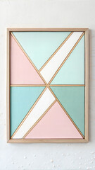 Framed pastel geometric art with gold accents.