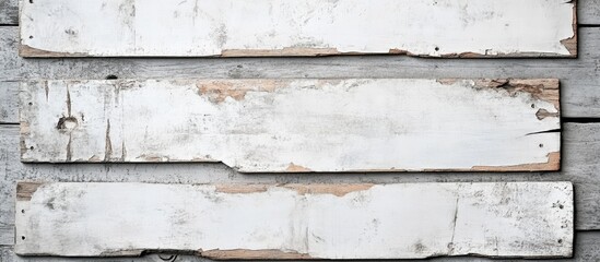 Vintage cracked white wooden boards on gray background with ample space for overlay text or design elements.
