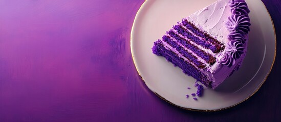 Fototapeta premium Top view of a vibrant ultraviolet cake slice on a plate with a smooth purple background ideal for promotional text or festive occasions