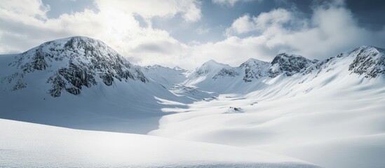Serene Snowy Mountain Landscape with Expansive White Fields Ideal for Text Placement in Winter Scenery