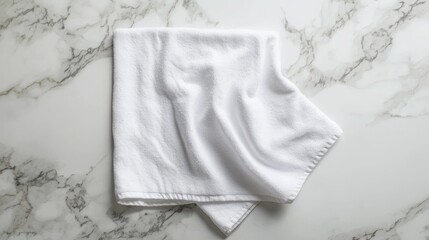 Obraz premium White tea towel mockup on marble surface ideal for spa and kitchen displays with water splash effect for creative advertising applications