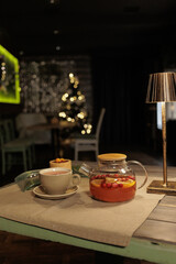 A cozy café and tea on a table.