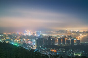 Fototapeta premium Overlooking the panoramic view and night scenery of Macau, China on July 26, 2024