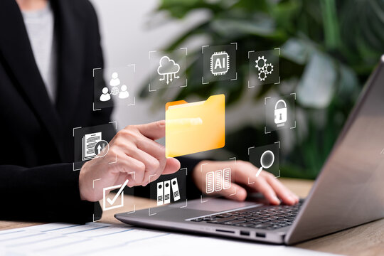 Document transformation, data storage management system concept, Businesswomen use technology software systems to manage company documents, Stores, Searches, Shares, loss risks protection, Retrieval - Powered by Adobe