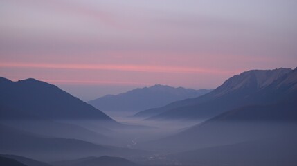 Obraz premium Scenic mountain sunrise with pink and blue sky