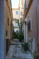 A street among the old houses of a historic district of the city of Gaeta, Italy.