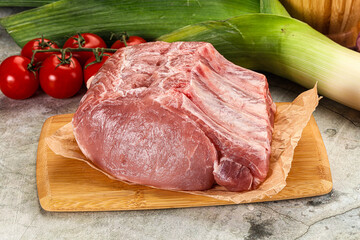 Raw pork loin cut with bone