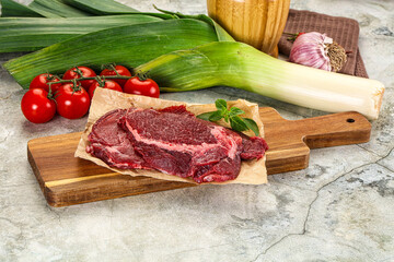 Raw beef cheeks cut for cooking