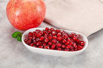 Ripe sweet red pomegranate seeds