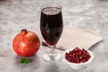Sweet fresh pomegranate juice with fruit