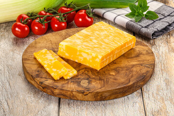 Marble yellow cheese with slices