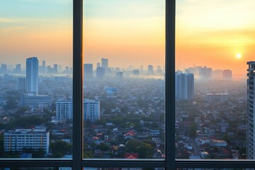 Breathtaking Cityscape at Sunset with Urban Skyline and Vibrant Colors Framed by Modern Windows in a High-Rise Building