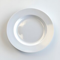 A plain white plate on a light background, suitable for serving food.