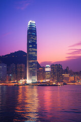 Fototapeta premium city ​​skyline with various simplified building shapes arranged along the horizon line with geometric design elements