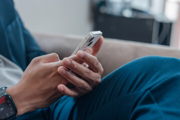 Close up man using smart phone, Social media marketing concept. hand using smartphone typing, chatting conversation in chat box icons pop up